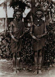 Two young Kikuyu men, carrying sticks, c1900. Creator: Unknown