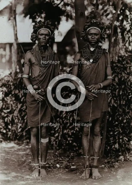 Two young Kikuyu men, carrying sticks, c1900. Creator: Unknown.