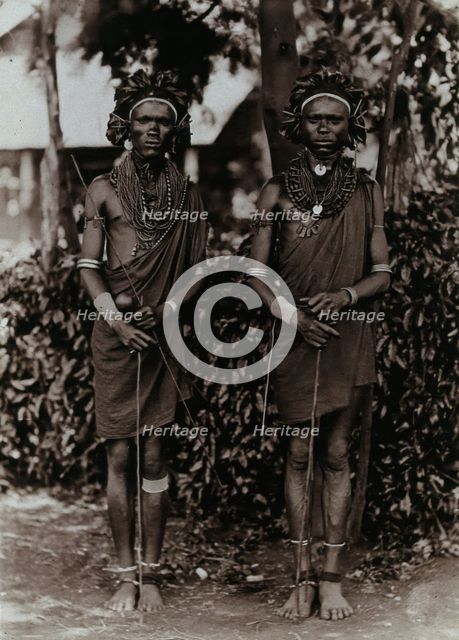 Two young Kikuyu men, carrying sticks, c1900. Creator: Unknown.