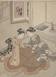 Two Young Women Seated by a Kotatsu Playing Cat's Cradle, ca. 1765., ca. 1765. Creator: Suzuki Harunobu