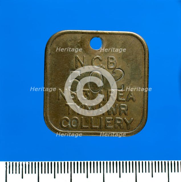 Tymawr Colliery, lamp check (brass), after 1947. Creator: Unknown.