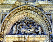 Tympanum of the Pieta on the façade of the Dominican nuns convent of Casalareina,16th century, in…