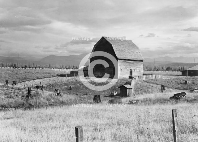 Type barn, characteristic of Idaho, on farm of older settler, Boundary County, Idaho, 1939. Creator: Dorothea Lange.