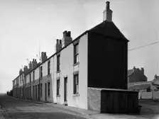 Typical mining town terrace, Queen Street, Swinton, South Yorkshire, 1957. Creator: Michael Walters