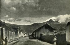 Typical Side Street in Mexican Village: The Town of Ameca and Cloud-Effect on Popocatepetl 1919. Creator: Unknown