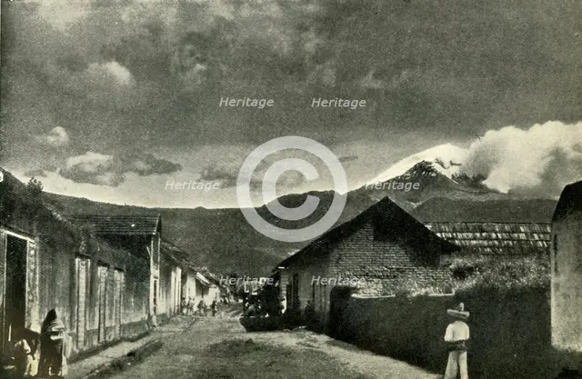 'Typical Side Street in Mexican Village: The Town of Ameca and Cloud-Effect on Popocatepetl', 1919. Creator: Unknown.