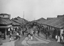 Typical Street Scene in Native Quarters, Colombo c1890, (1910). Artist: Alfred William Amandus Plate