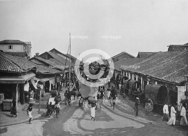 'Typical Street Scene in Native Quarters, Colombo', c1890, (1910). Artist: Alfred William Amandus Plate.