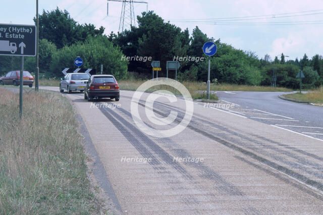 Tyre skidmarks on road surface. Artist: Unknown.