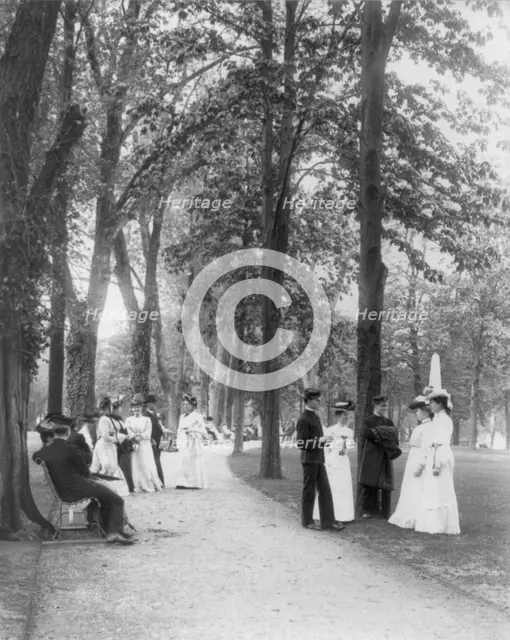 U.S. Naval Academy, Annapolis, Md. 1902?: midshipmen and visitors on grounds, (1902?). Creator: Frances Benjamin Johnston.