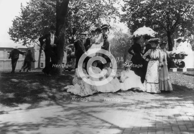 U.S. Naval Academy, Annapolis: cadets and women on lawn, (1902?). Creator: Frances Benjamin Johnston.
