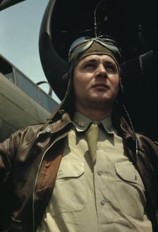U.S. Army Air Forces pilot in front of a YB-17 bombing..., probably Langley field, Virginia, 1942. Creator: Alfred T Palmer