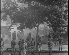 U.S Army Soldiers Confronting Protesting Soldiers With Tear Gas and Bayonets To Disperse..., 1932. Creator: British Pathe Ltd
