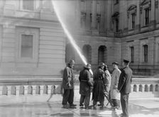 U.S. Capitol - Cleaning Exterior, 1913. Creator: Harris & Ewing