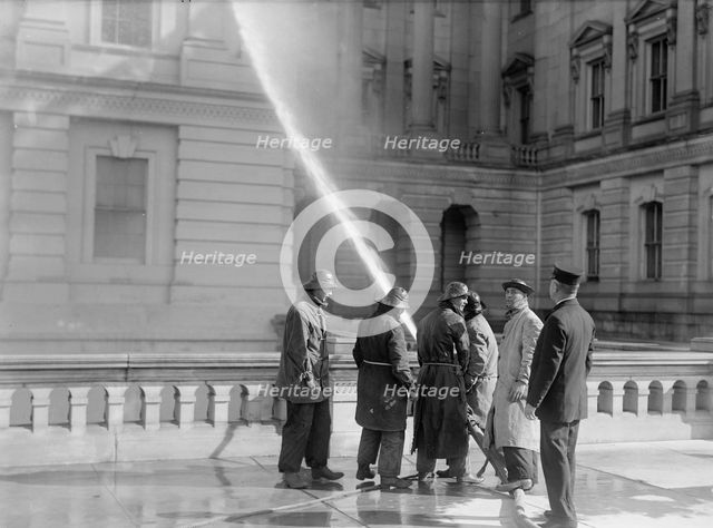 U.S. Capitol - Cleaning Exterior, 1913. Creator: Harris & Ewing.