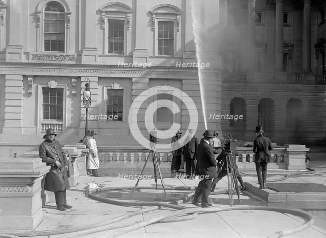 U.S. Capitol - Cleaning Exterior, 1913. Creator: Harris & Ewing.