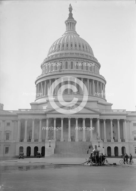 U.S. Capitol - Cleaning Exterior, 1913. Creator: Harris & Ewing.