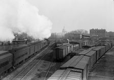 U.S. Capitol - Dome from Railroad Yards in Southeast Section, 1917. Creator: Harris & Ewing