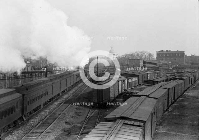 U.S. Capitol - Dome from Railroad Yards in Southeast Section, 1917. Creator: Harris & Ewing.