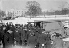 U.S. Capitol - Visitors, Etc., Casket Being Placed In Hearse, 1914. Creator: Harris & Ewing