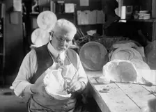U.S.J. Dunbar with Death Mask of Admiral Dewey, 1917. Creator: Harris & Ewing