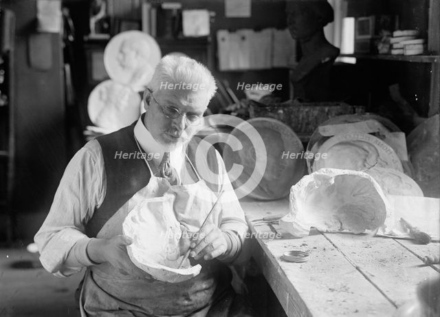 U.S.J. Dunbar with Death Mask of Admiral Dewey, 1917. Creator: Harris & Ewing.