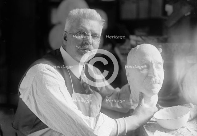 U.S.J. Dunbar with Death Mask of Admiral Dewey, 1917. Creator: Harris & Ewing.