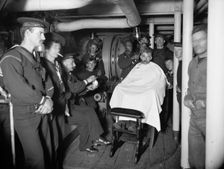 U.S.S. Brooklyn, barber shop, between 1896 and 1901. Creator: Unknown