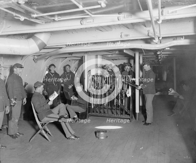 U.S.S. Brooklyn, group on gun deck, between 1896 and 1899. Creator: Unknown.
