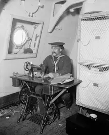 U.S.S. Brooklyn, ship's tailor, between 1896 and 1899. Creator: Unknown