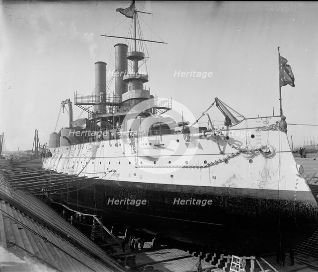 U.S.S. Iowa in dry dock, Brooklyn Navy Yard, between 1897 and 1901. Creator: Unknown.