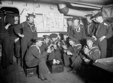 U.S.S. Maine sailors amusements, between 1895 and 1898. Creator: Edward H Hart