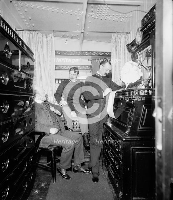 U.S.S. Maine, paymaster's room, 1896. Creator: Unknown.