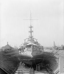 U.S.S. Massachusetts in dry dock, between 1896 and 1901. Creator: William H. Jackson