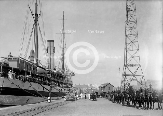 U.S.S. Memphis, Caskets of Dead, Brought Home By U.S. Hospital Ship 'Solace', 1916. Creator: Harris & Ewing.