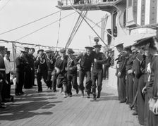 U.S.S. New York, 3 legged race, anniversary of Santiago, 1899 July 3. Creator: Unknown