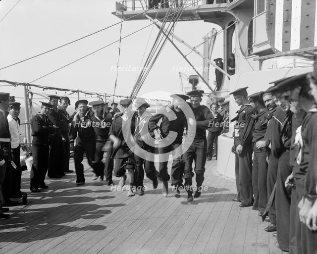 U.S.S. New York, 3 legged race, anniversary of Santiago, 1899 July 3. Creator: Unknown.