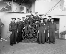 U.S.S. New York, a gun crew, anniversary of Santiago, 1899, 1899. Creator: Edward H Hart