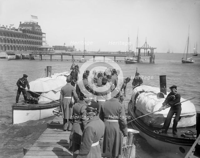 U.S.S. New York, band going aboard at Hampton Roads, between 1893 and 1901. Creator: Edward H Hart.