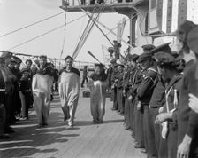 U.S.S. New York, sack race, anniversary of Santiago, 1899 July 3. Creator: Unknown