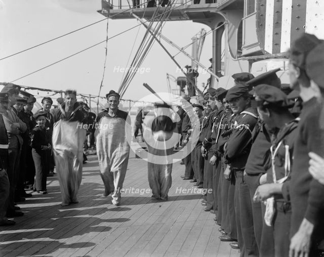 U.S.S. New York, sack race, anniversary of Santiago, 1899 July 3. Creator: Unknown.