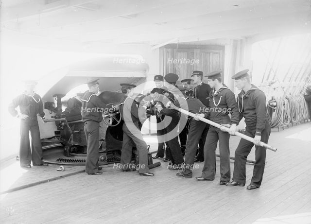 U.S.S. Newark, loading 6-inch gun, between 1891 and 1901. Creator: Unknown.