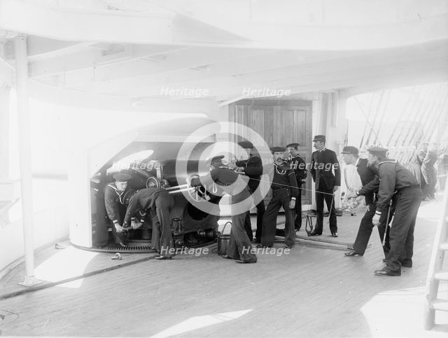 U.S.S. Newark, sighting 6-inch gun, between 1891 and 1901. Creator: Unknown.