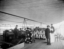 U.S.S. Texas, presentation of cross and badge to Ensign Gherardi by the King's..., Aug. 8, 1897. Creator: Unknown