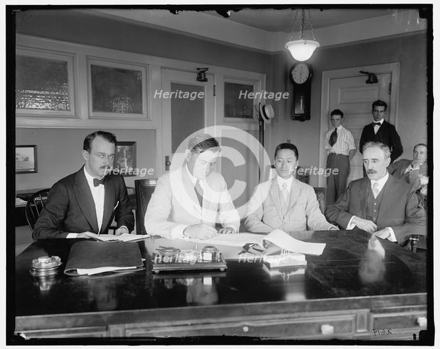 U.S. Shipping Board signing contract w/China, between 1910 and 1920. Creator: Harris & Ewing.