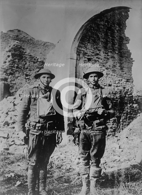 U.S. soldiers & German pistol, 11 Mar 1918. Creator: Bain News Service.
