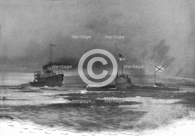 'Un bateau brise-glaces ouvre un chenal devant un sous-marin russe a son retour de croisiere', c1915 Creator: Unknown.
