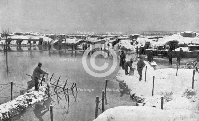 'Un secteur humide; L'inondation d'un cantonnement de deuxieme ligne en Champagne', 1917. Creator: Unknown.