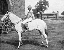'Un petit noir de Bamako sur le cheval Oualata de race indigene; L'Ouest Africain 1914. Creator: Unknown