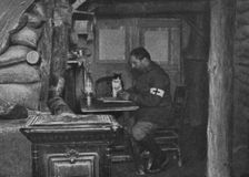 Un relais d'ambulance modele; Entrée de la salle de pansements, servant de bureau..., c1916. Creator: Unknown